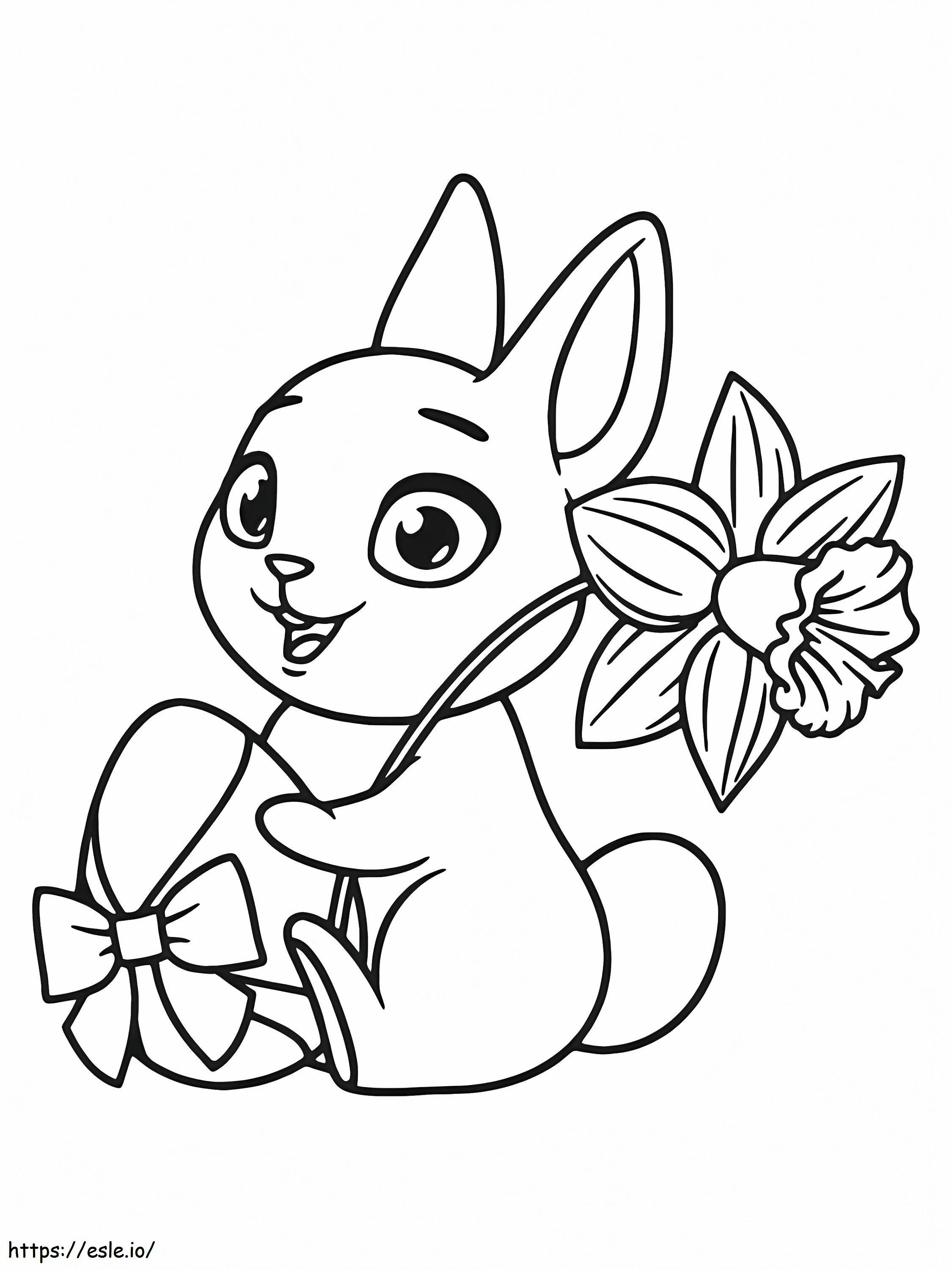 Coloriage Joli lapin de Pâques tenant une fleur à imprimer dessin