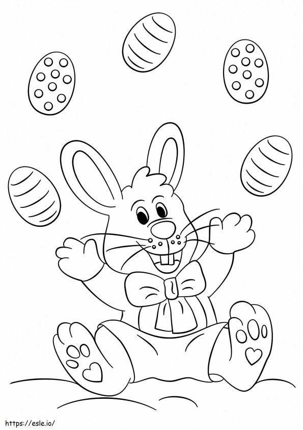 Coloriage Lapin de Pâques jouant avec un oeuf à imprimer dessin