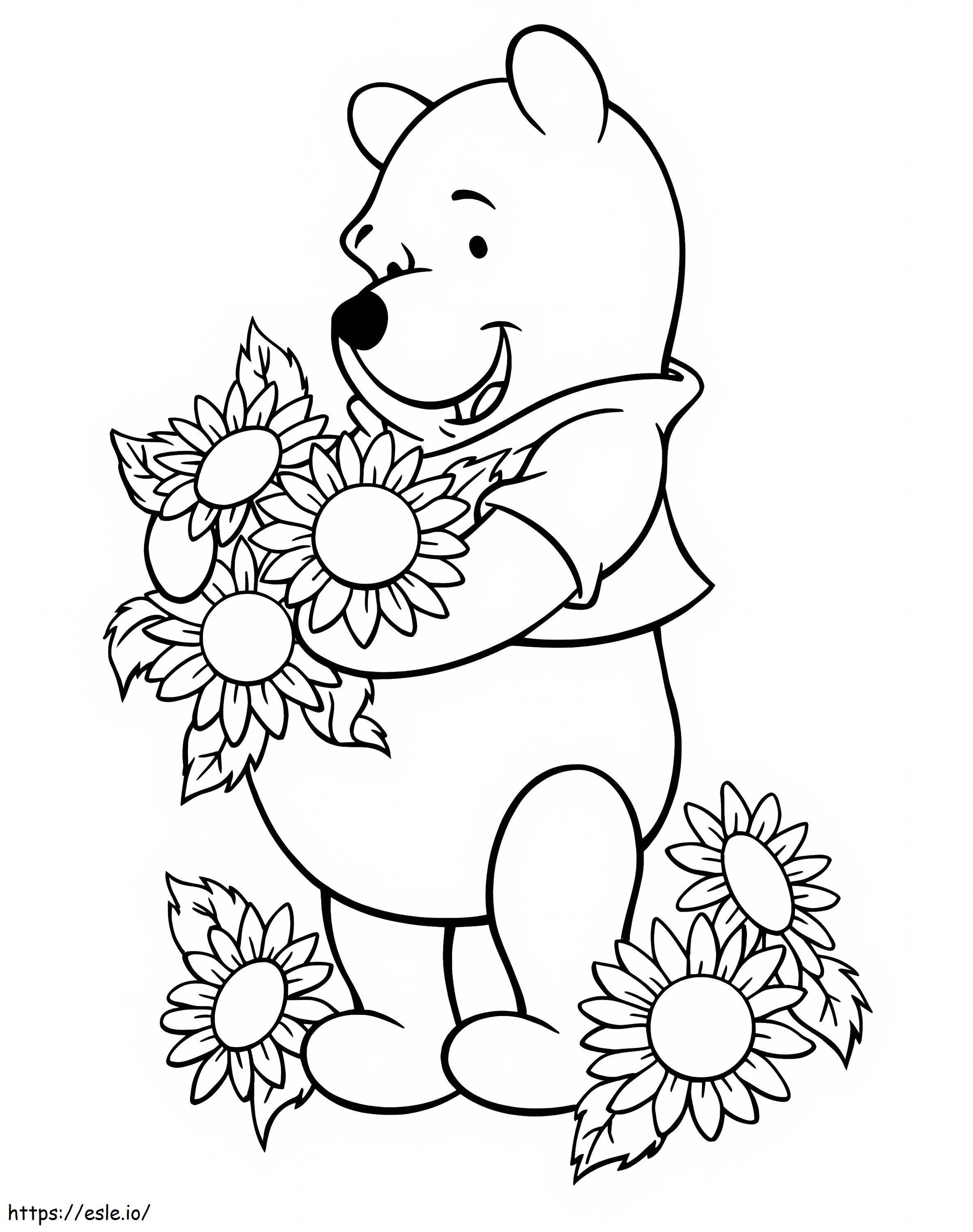 Coloriage Winnie l'ourson porte un tournesol à imprimer dessin
