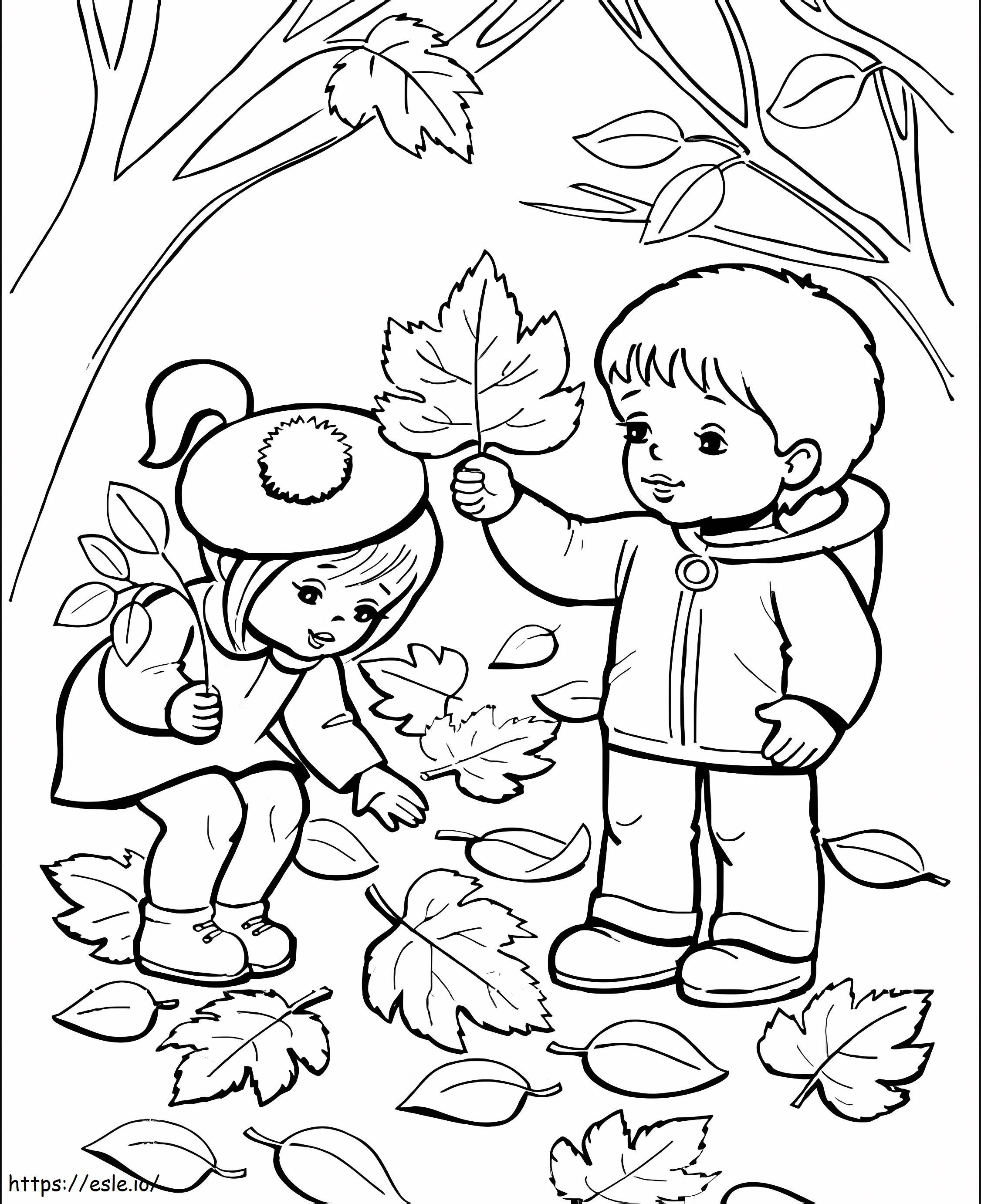Coloriage Deux enfants mignons avec des feuilles en automne à imprimer dessin