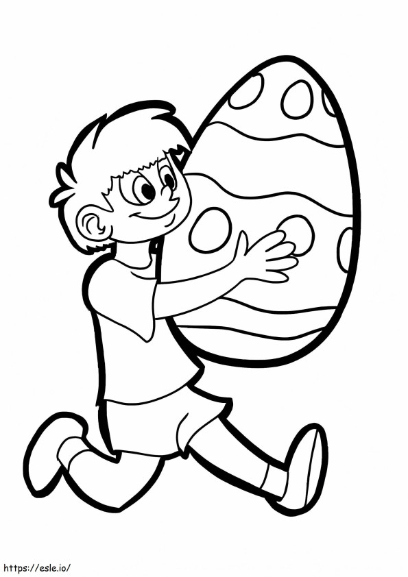 Băiat ținând ou de Paște de colorat