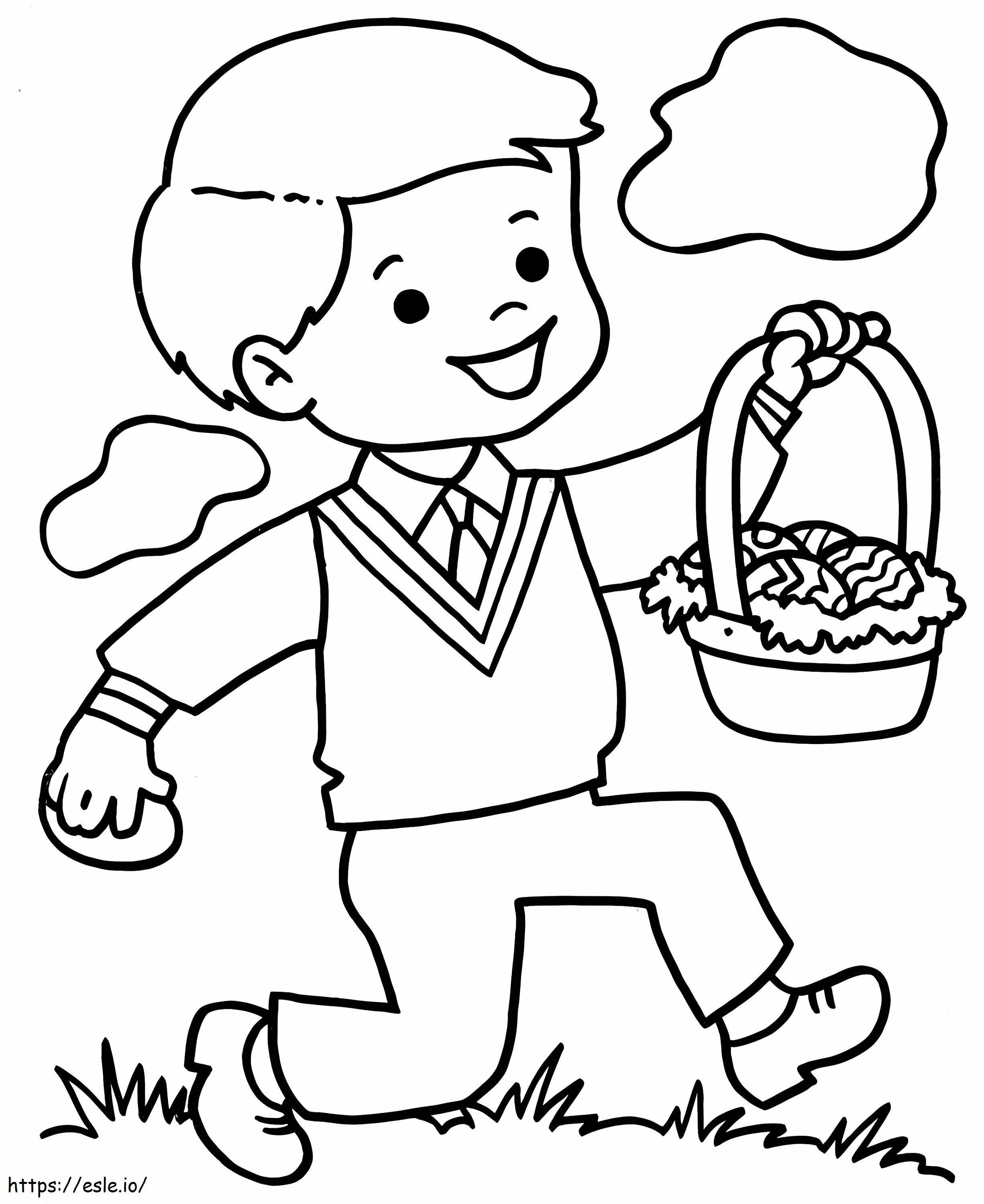 Băiat ținând coș de Paște de colorat