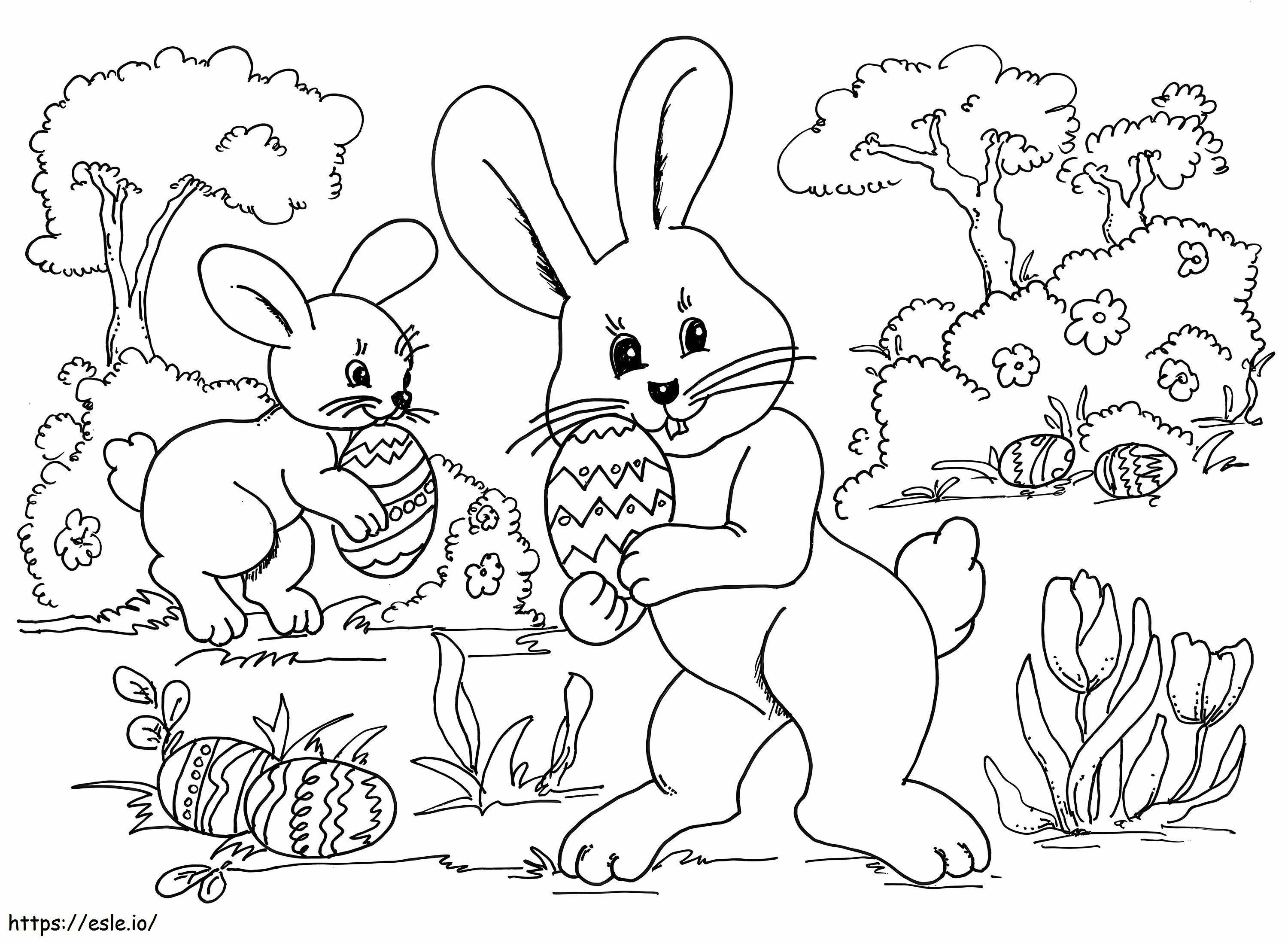 Due coniglietti con l'uovo di Pasqua da colorare