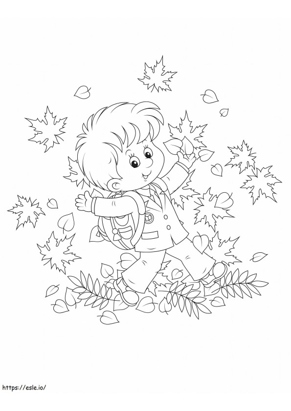 Coloriage Joyeux garçon avec des feuilles en automne à imprimer dessin